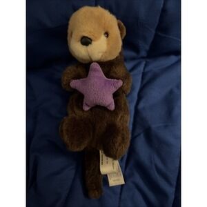 Aurora Sea Otter Brown Holding Purple Starfish Plush Stuffed Animal Toy Plush 9"